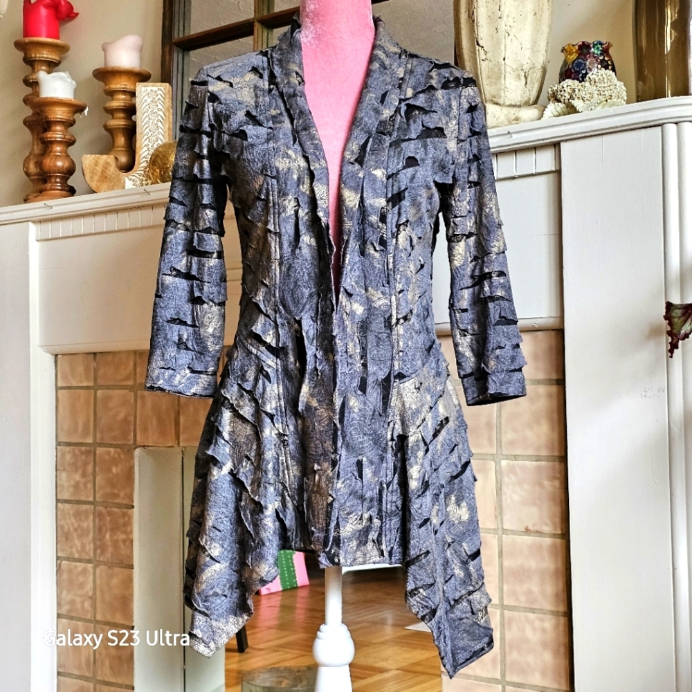 Frank Lyman cardigan. Distressed look. Size 4